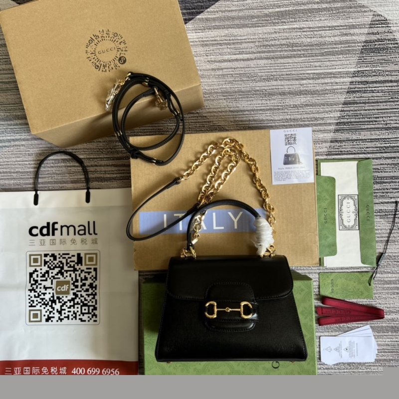G*u*i top handle bags